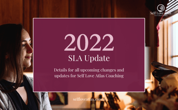 header image for 2022 SLA Update. The image features the title fo the blog post on a maroon background. The background image features certified life coach Morgan Barbret standing in her kitchen looking out the window over the sink. In the foreground there is a bouquet of flowers including white roses and pink/maroon lilies.