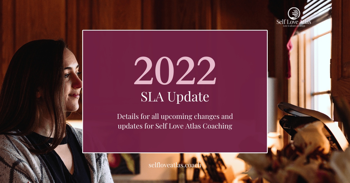 header image for 2022 SLA Update. The image features the title fo the blog post on a maroon background. The background image features certified life coach Morgan Barbret standing in her kitchen looking out the window over the sink. In the foreground there is a bouquet of flowers including white roses and pink/maroon lilies.